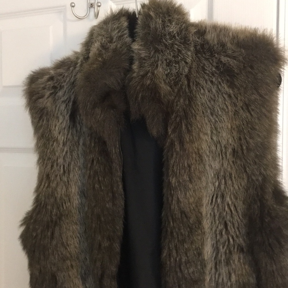 Fur vest vey cute and warm.